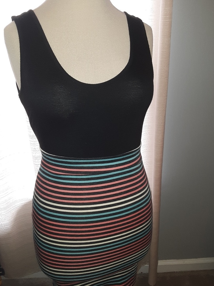 Very cute form fitting mini dress